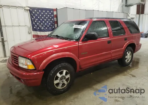 2000 Oldsmobile Bravada из США, поврежденный, VIN 1GHDT13W0Y2144348